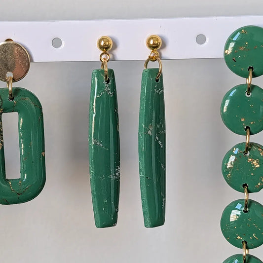Arlena curvo verde claro y dorado