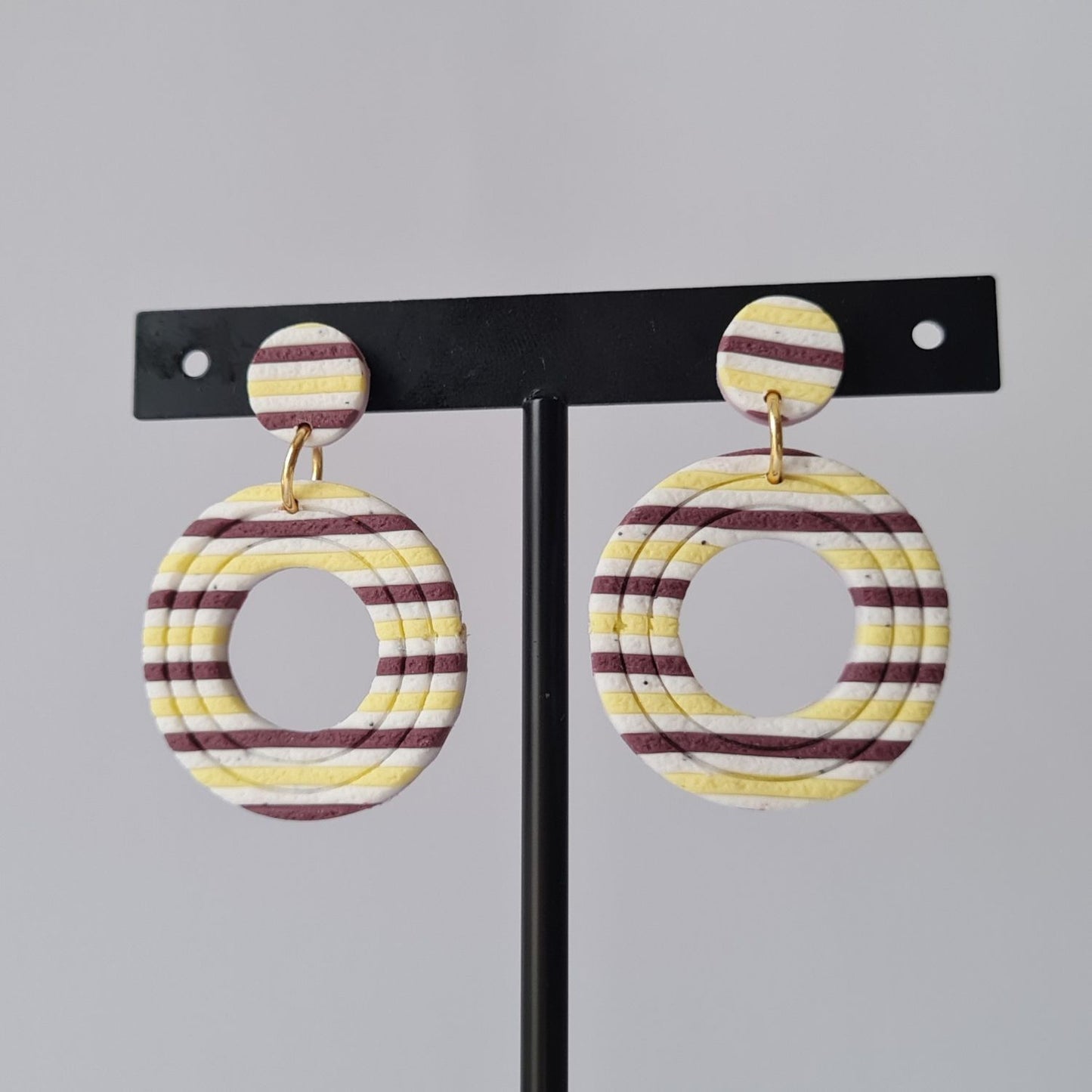 Elba rayas morado, amarillo y blanco