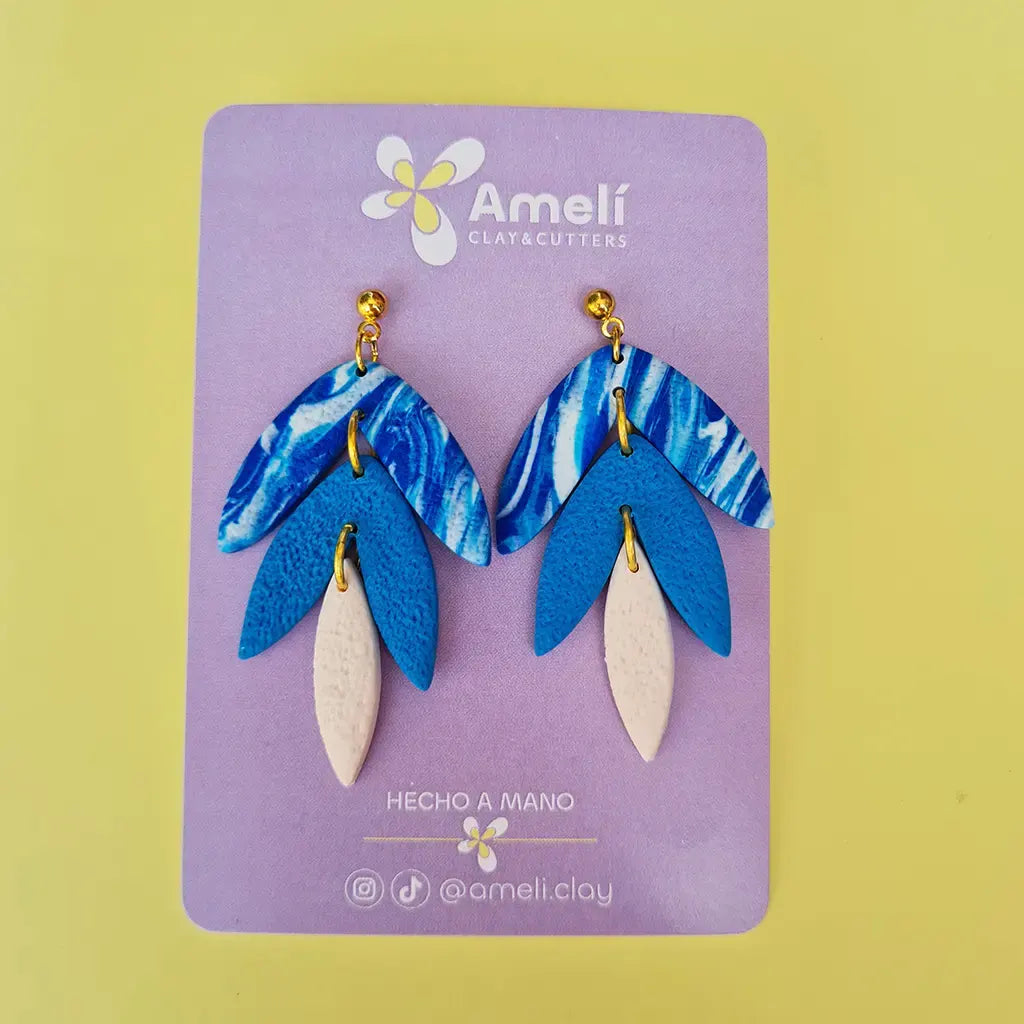 Lluvia estampado azul turquesa y blanco