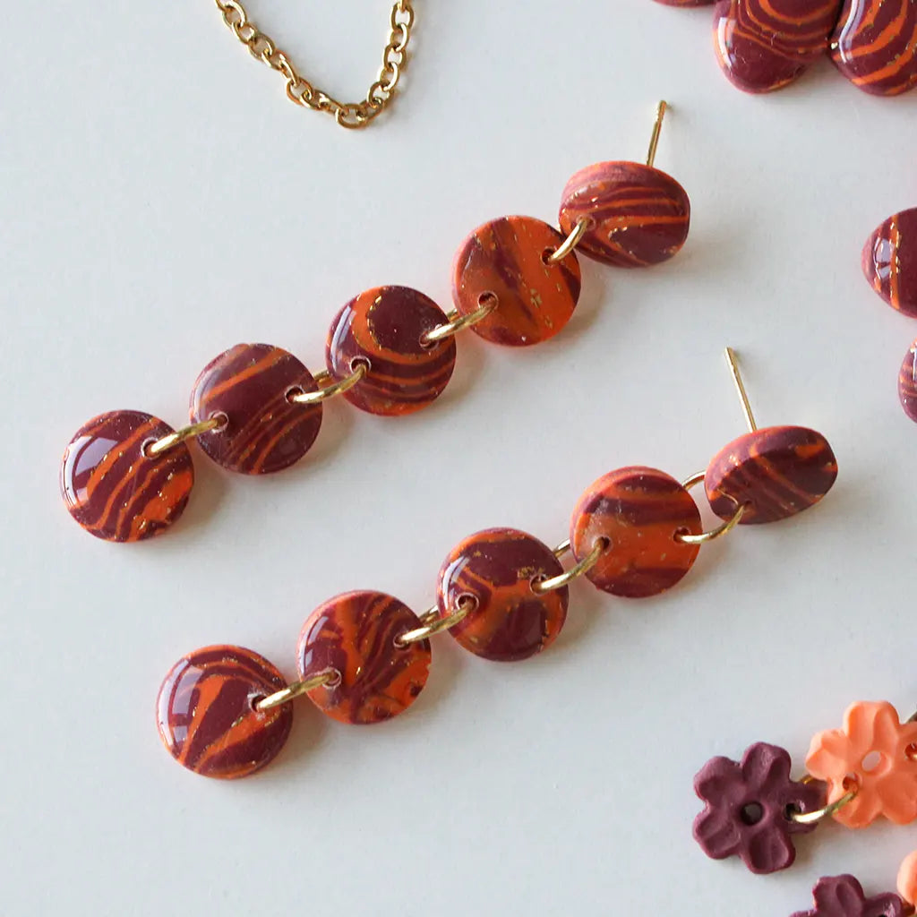 Nilo estampado naranja y morado
