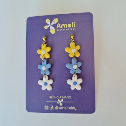 Amelí amarillo, azul y blanco