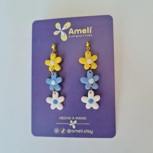 Amelí amarillo, azul y blanco