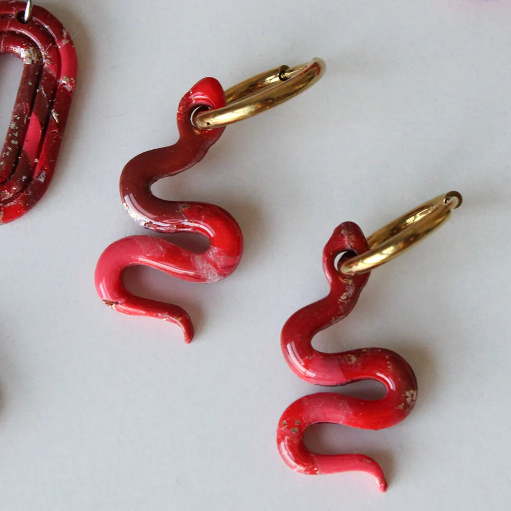 Charm serpiente estampado rojo