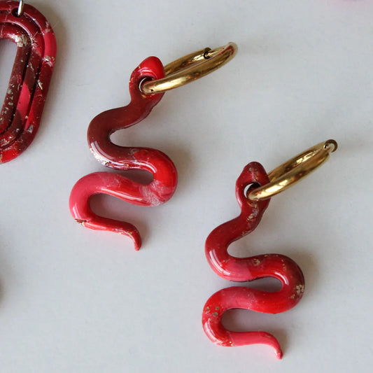Charm serpiente estampado rojo
