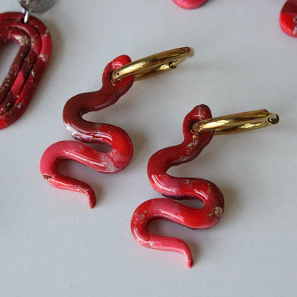 Charm serpiente estampado rojo