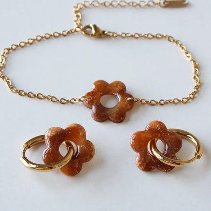 Flor charm ámbar