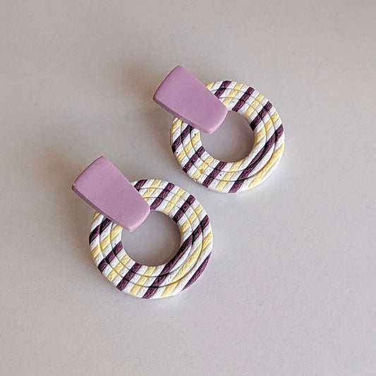 Índigo rayas morado, blanco y amarillo