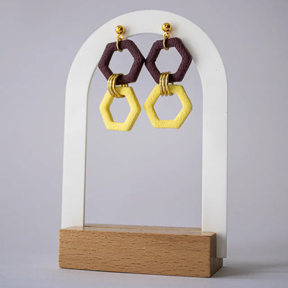 Múcura amarillo y morado