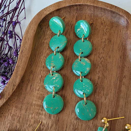 Nilo 5 verde claro y dorado