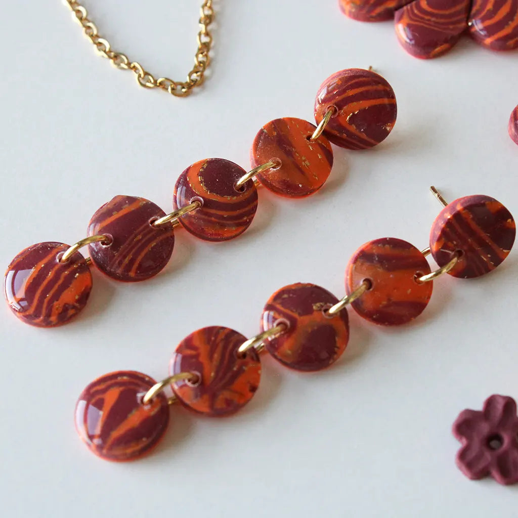Nilo estampado naranja y morado