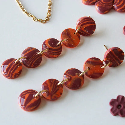Nilo estampado naranja y morado