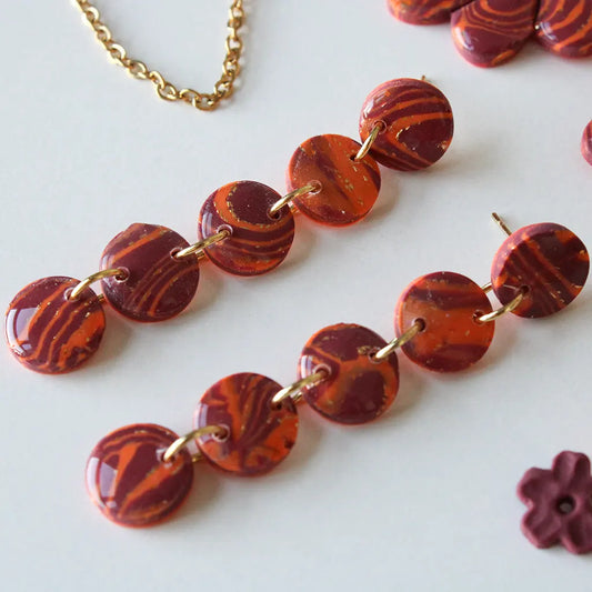 Nilo estampado naranja y morado
