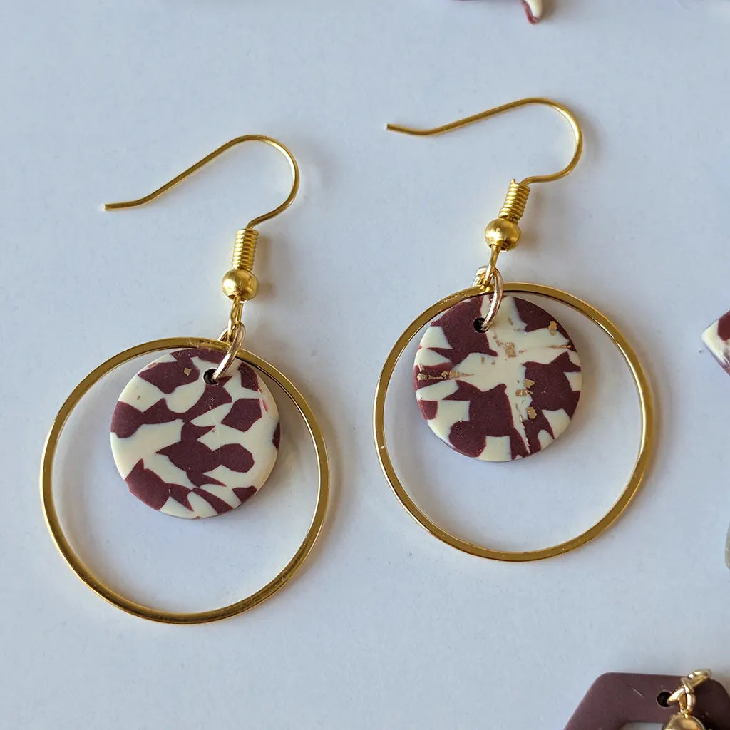 Órbita estampado beige y marrón chocolate