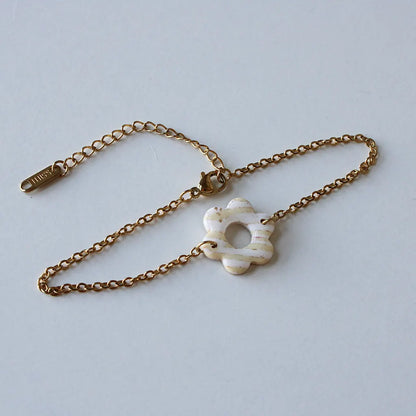 Pulsera flor rayas beige
