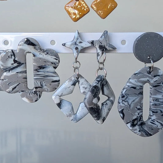 Stella estampado blanco, gris y negro